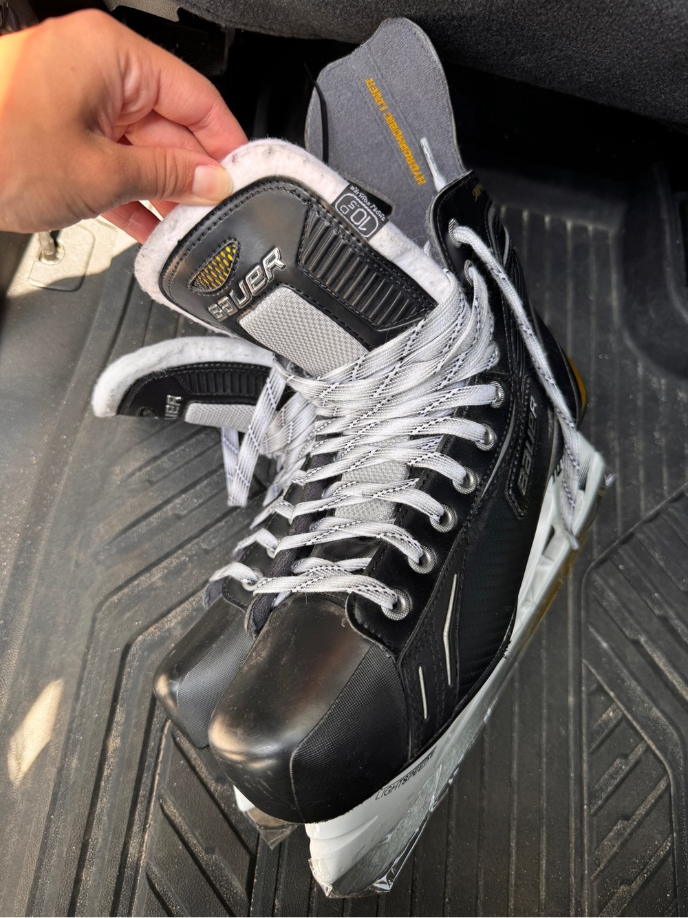 Bauer Black and White Men's Hockey Skates with Subtle Gold Accent